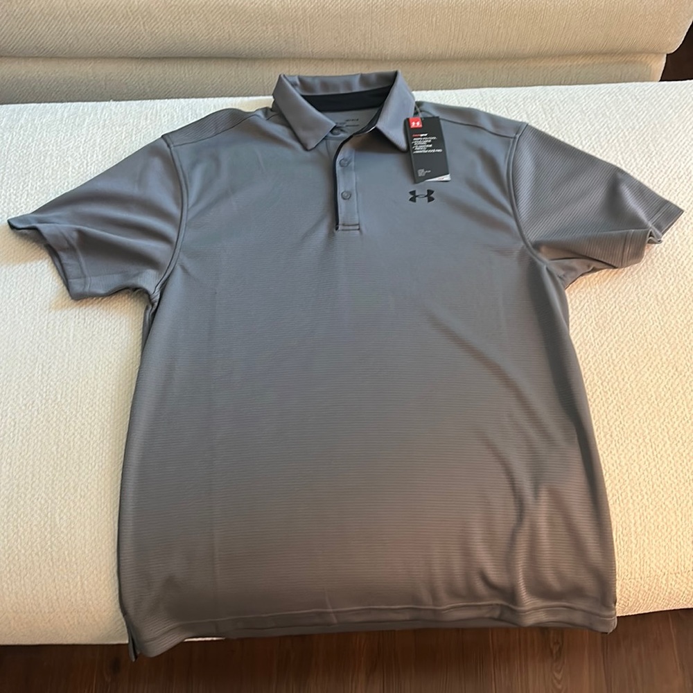 Brand new, Men’s Under armour loose heat gear golf shirt, size L, 100% polyester